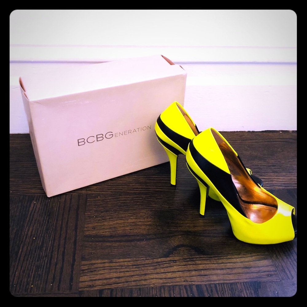 Neon yellow and black patent leather heels
